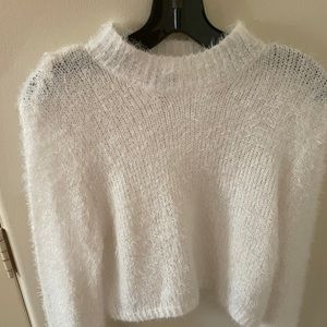 white fuzzy sweater